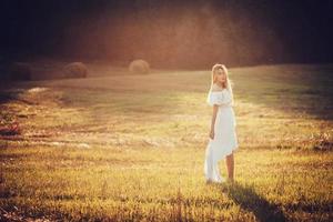 Girl dressed in field photo