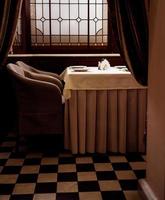 an empty table in a cafe photo