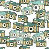 Photo camera vintage seamless pattern. Retro photo cameras design. Repeated texture in doodle style. vector