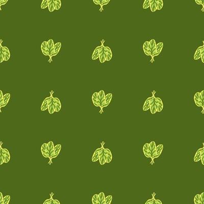 Seamless pattern bunch spinach salad on green background. Minimalistic ornament with lettuce.