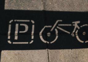 bicycle parking sign in the city photo