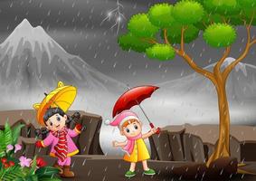 ilustración de dos niñas pequeñas que disfrutan de un día lluvioso vector