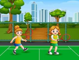 Happy girls playing tennis at the court vector