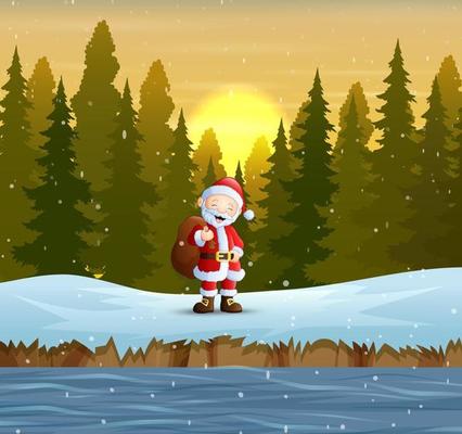 Santa claus with a sack of presents in the forest