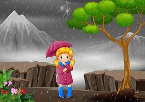 una niña con paraguas bajo la lluvia en el bosque vector