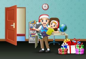 Happy father with his son celebrate a christmas on the office vector