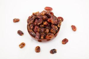 sweet dates isolated on a white background photo