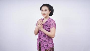 beauty in kebaya smiling Javanese gesture isolated on white background photo