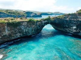 Aerial drone view of Broken Beach on Nusa Penida Island, Bali, Indonesia photo