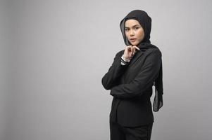 Beautiful business woman with hijab portrait on white background photo