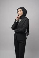 Beautiful business woman with hijab portrait on white background photo