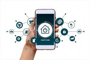 Hand of woman holding smartphone in house with icons, lifestyle of person in modern life internet of things, smart home technology. concept of automation. the new innovation of the future photo