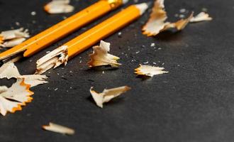 Broken pencil with shavings. photo