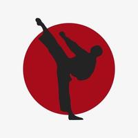 una silueta vectorial de patada de karate. Ilustración de vector de arte marcial. sol naciente japonés