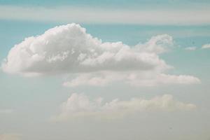 Beautiful white fluffy clouds sky background abstract season and weather. photo