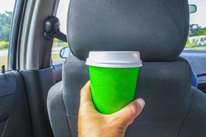 Mexican coffee to go holding while driving in Mexico. photo