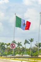 Huge mexican green white red flag in Akumal Mexico. photo