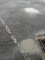 The wet brick paving road photo