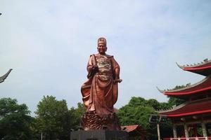 a giant statue of admiral cheng ho in sam poo kong semarang photo