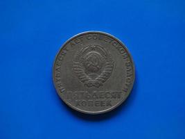 Vintage Russian ruble coin over blue photo