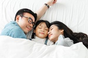 small asian family portrait at home photo