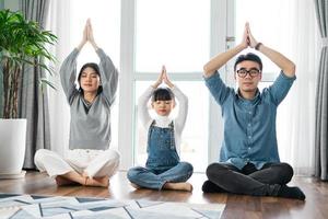 small asian family portrait at home photo