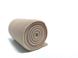 Medical Elastic bandage roll for first aid isolated on white background photo