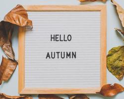 Inscription Hello October on white letter board photo