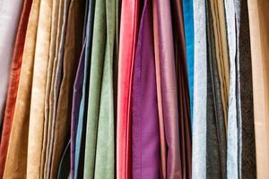 different types of curtains and fabrics hanging photo
