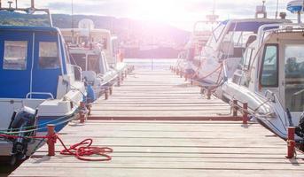 wooden pier for motor boats and sailing yachts. photo