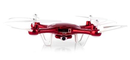 red drone flying isolated on white background. Clsoe up of fly drone photo