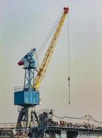 High crane on the construction site photo