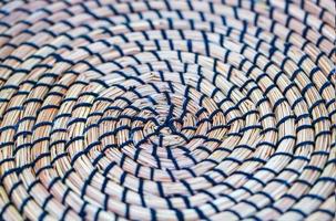 Wicker plate holder.Details of wicker plate. Selective focus photo