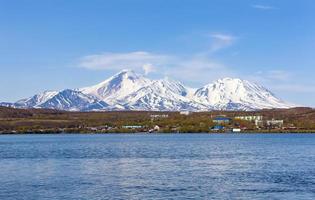 Avachinsky volcano towers over the city of Petropavlovsk-Kamchatsky. photo