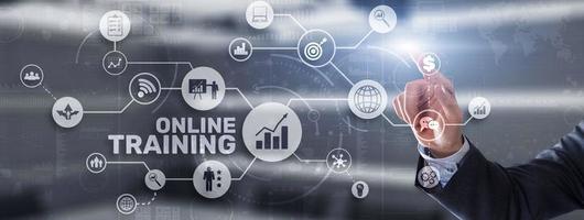 Online Training concept. Business Hand pressing OT inscription photo
