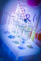 The test tubes and flasks with colored liquid in a laboratory photo