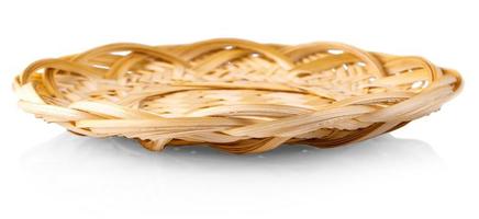the cutout of empty wicker basket on white background photo
