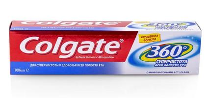 Colgate tooth paste on white.Colgate is a brand of toothpaste produced by Colgate-Palmolive photo