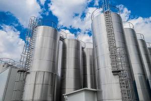 stainless steel tanks at a food processing plant top view photo