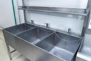 Stainless steel washbasins for disinfection photo