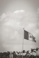 Huge mexican green white red flag in Akumal Mexico. photo