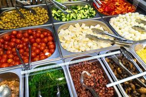 ingredients for picking salads in the supermarket photo