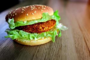 delicious and beautiful Burger on the table photo