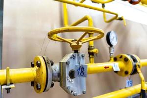 The valve of the heating system in close-up in the boiler room photo