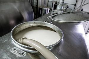 milk in the fridge on the dairy farm photo