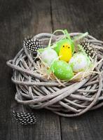 Easter eggs in a nest photo