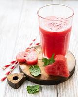 Watermelon smoothie and fresh watermelon photo