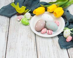 Easter eggs and tulips photo