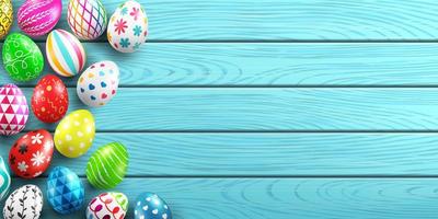 Handmade painted easter eggs on wood background.Colorful easter eggs decoration on wood table top view with copy spac.Easter eggs with different texture.Vector illustration EPS10 photo