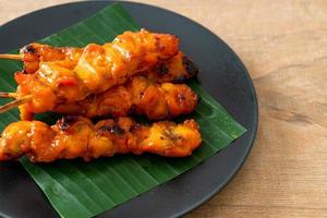 grilled chicken skewer in Asian style photo